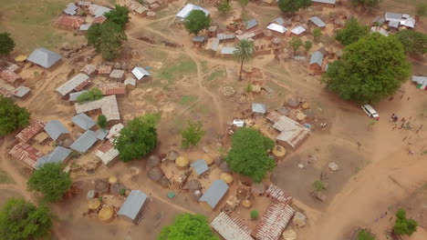 rural farming village in nigeria, west africa - aerial reveal