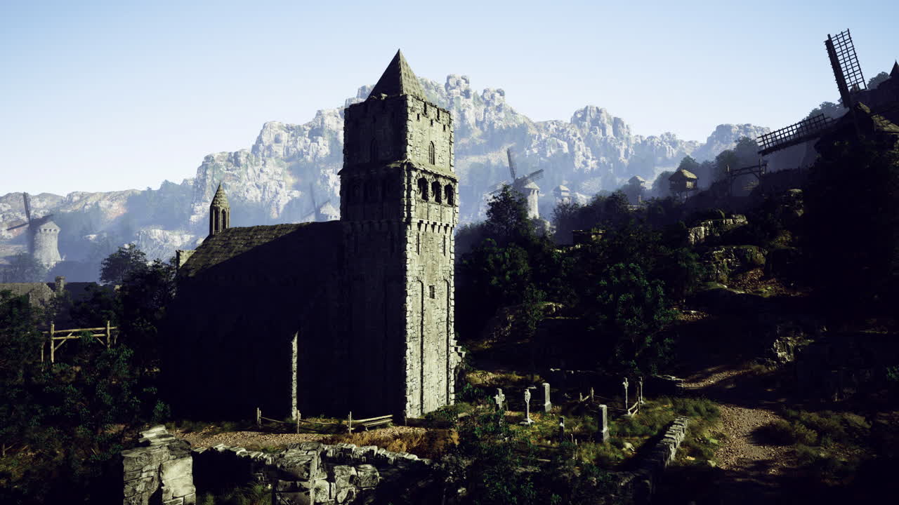 Ancient stone church on hillside surrounded by mountains and windmills