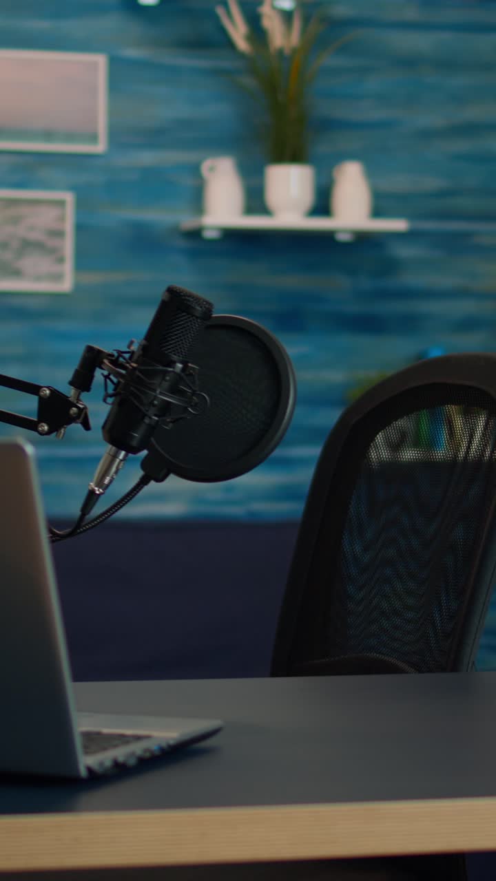 Vertical video: Empty podcast room with professional microphone