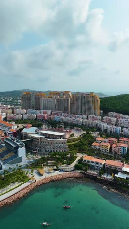 vertical aerial view of phu quoc island in vietnam, showcases a replica of an italian city with distinctive architecture, busy streets, and a lively atmosphere during sunset. sunset town.