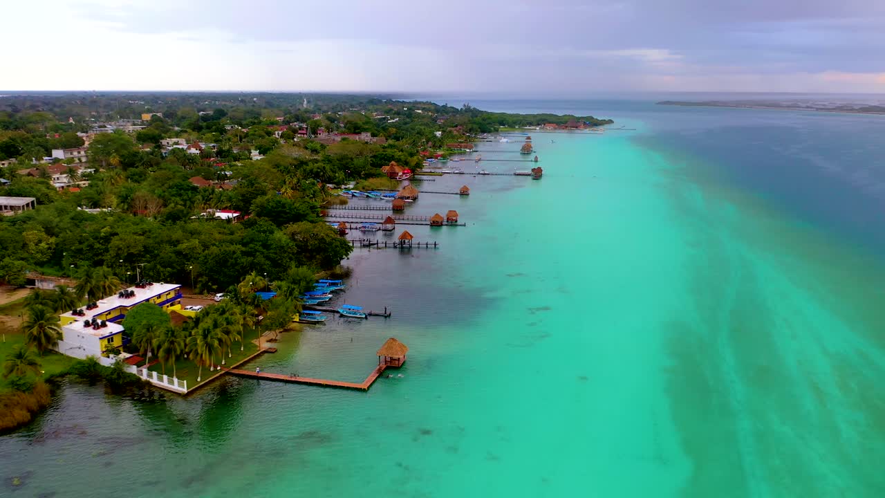Bacalar Mexico , fresh water lake with piers. Drone footage at 4K 30fps
