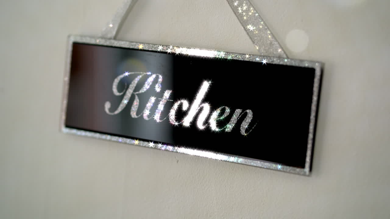 Kitchen sign black and sliver on wall sparkling