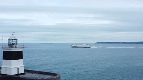 holyhead breakwater lighthouse longest concrete coastal sea protection landmark aerial view ferry departing harbour