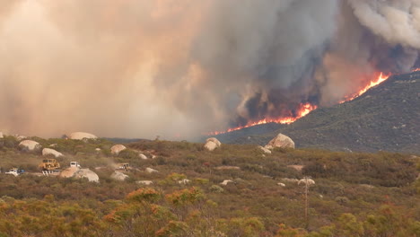 fairview wildfire raging through mountainside vegetation in windy