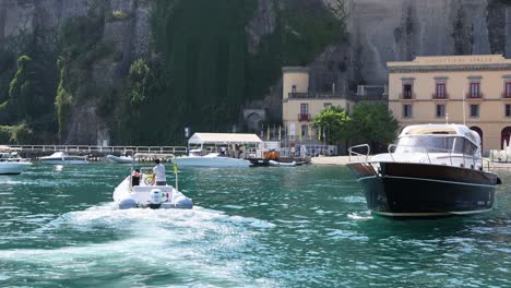 two boats navigating near sorrento, naples