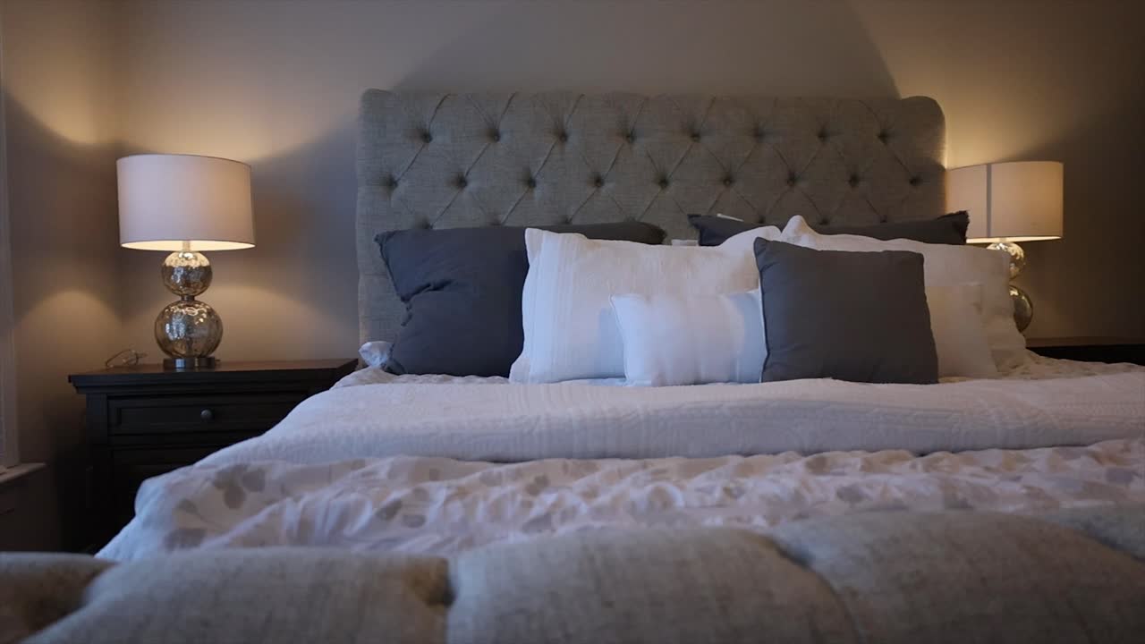 Close up pan of king size bed