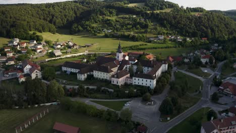 aerial view of a monastery in a picturesque village