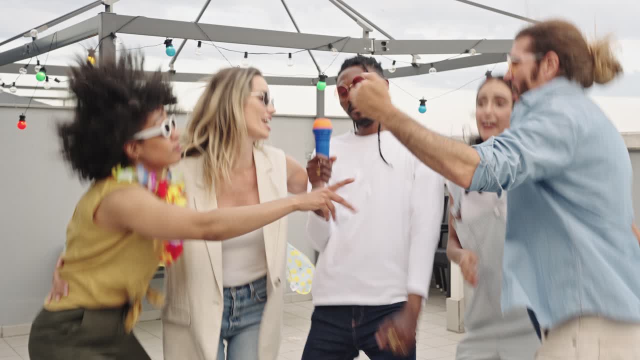 A group of friends celebrating on a rooftop party