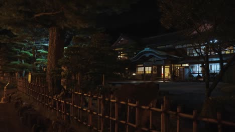 traditional japanese style ryokan hotel, peaceful scene at night