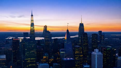 skyscrapers of lower manhattan rise majestically against a vibrant sunset, creating a stunning urban skyline