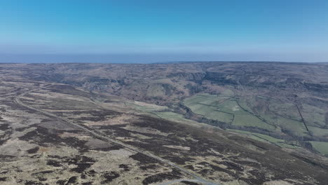 North-York-Moors,-near-Blakey-Ridge-and-Rosedale,-Aerial-footage-push-forward-across-moors-towards-dale---Mavic-3-Cine-Prores-March-2022---Clip-1