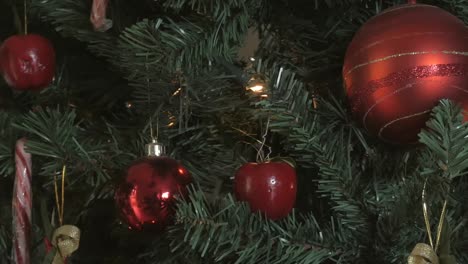 Close-Up-Panning-Shot-Ball-Decoration-and-Lighting-of-Christmas-Tree