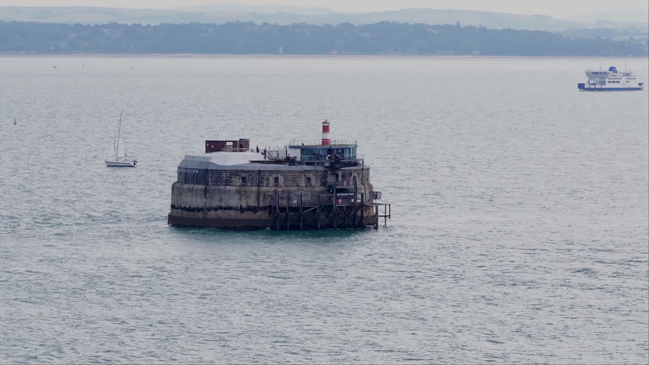Spitbank fort luxury hotel aerial view with ferry and yacht sailing near the Portsmouth attraction
