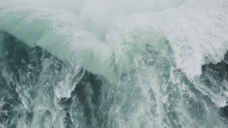 Waterfall Dynamic Aerial Top Down Epic Drone Water Thundering Over Cliff River Niagara Falls Canada Usa New York Tourist Attraction
