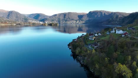 stavenes in vaksdal norway, aerial revealing sorfjorden sea at sunny day