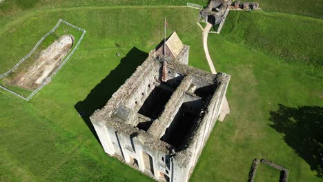 rising aerial view of castle rising, norfolk, uk