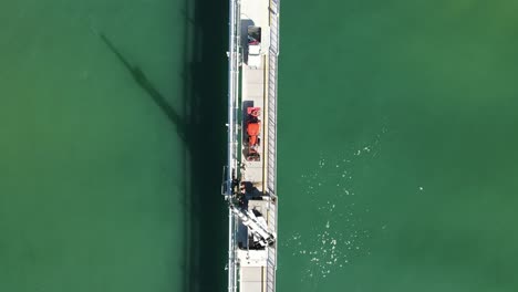 large construction machinery working on an industrial platform constructed out in the ocean