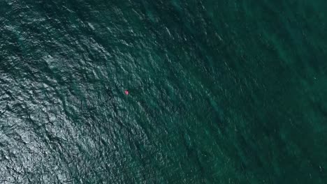 High-birds-eye-view-of-a-solo-windsurfer