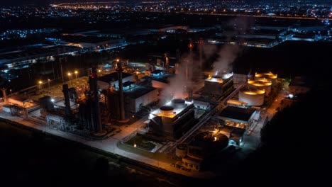 aerial hyperlapse timelapse of powerplant or fuel gas powerplant at night