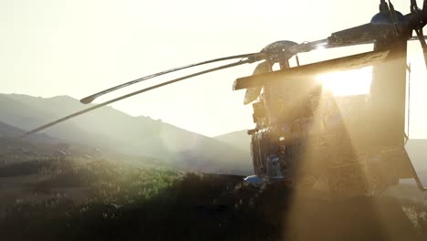 old rusted military helicopter in the desert at sunset