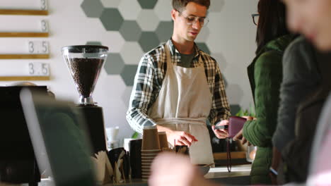 Coffee-shop,-barista-and-electronic-payment