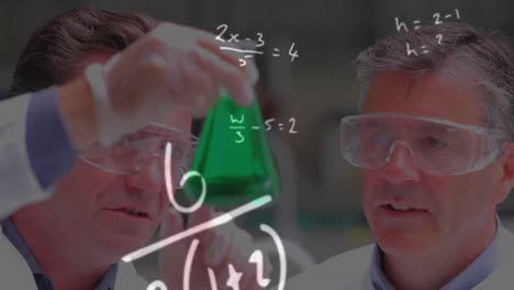 mathematical equations floating against two senior male health workers working at laboratory