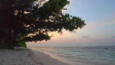 beautiful sunset on a private island in the maldives