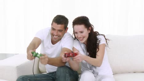 Couple-Playing-video-games-at-home