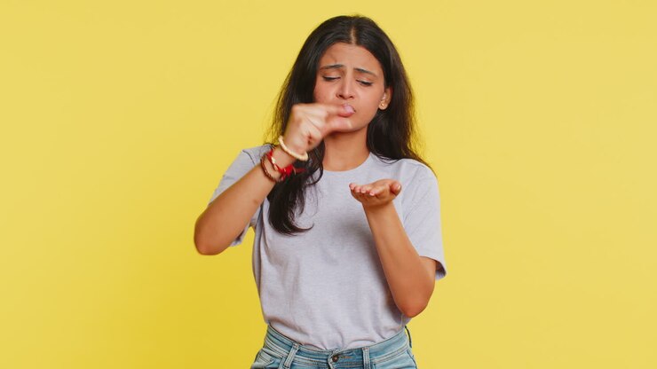 Woman show a little bit gesture, begging help, need some more, please give me measuring small size
