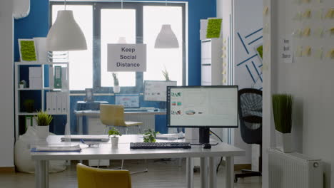 keep social distance sign in empty business office