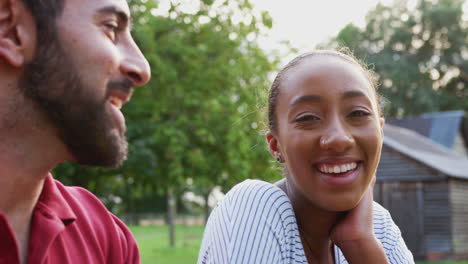 Romantic-Couple-Taking-A-Break-During-Walk-In-Countryside