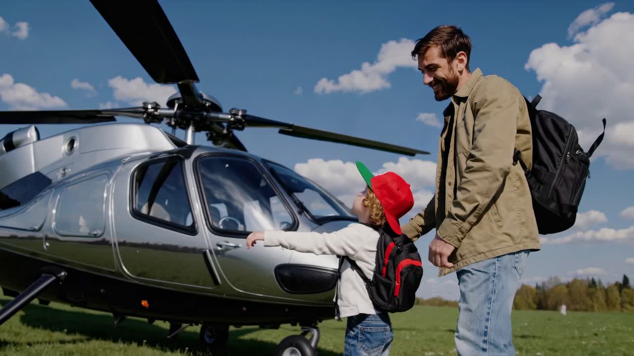 Father and Son near a Helicopter