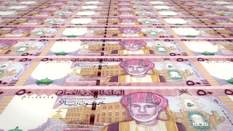 serie de billetes de cincuenta riales omanesos del banco central de omán rodando en la pantalla, monedas del mundo, dinero en efectivo, bucle