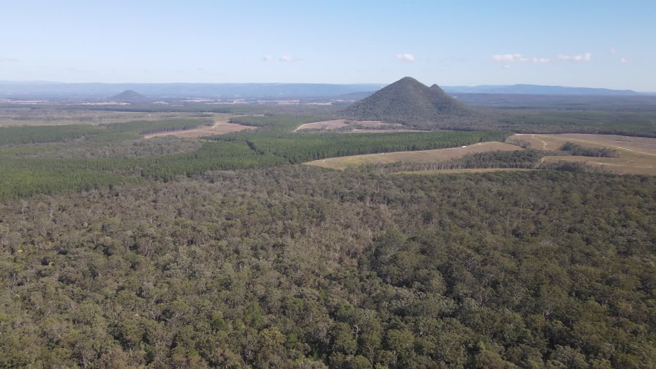 Drone aerial slowly panning over a mountain in the sunshine coast in Queensland