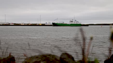 grindavik, iceland port with ship and water timelapse