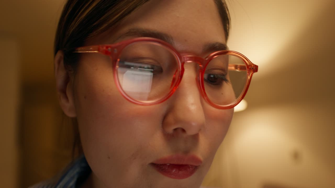 Woman drinking coffee or tea while working at home