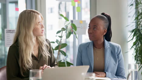 businesswomen in a collaborative meeting