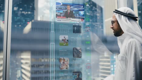 successful muslim businessman in traditional white clothes checking news messages on futuristic augmented reality screen in glass elevator in business center. saudi, emirati, arab businessman concept.