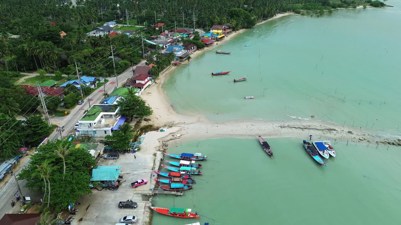 Koh Samui Pier long tail boat docks Thailand holiday destination island, aerial drone