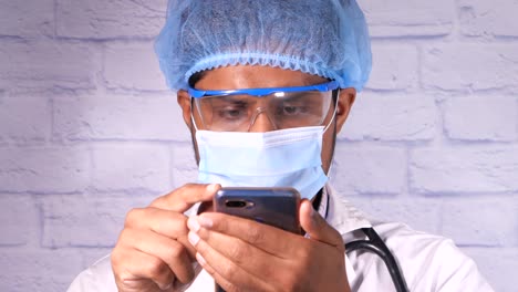 doctor using smartphone for online consultation