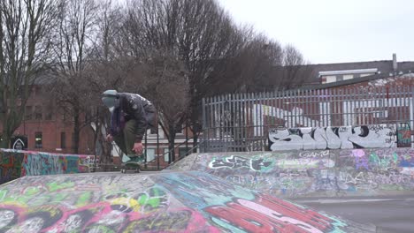 skateboarding in slow motion at an urban skate park