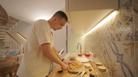 loving couple making a sandwich in kitchen-living room