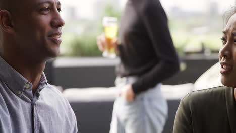 Friends-discussing-on-a-rooftop