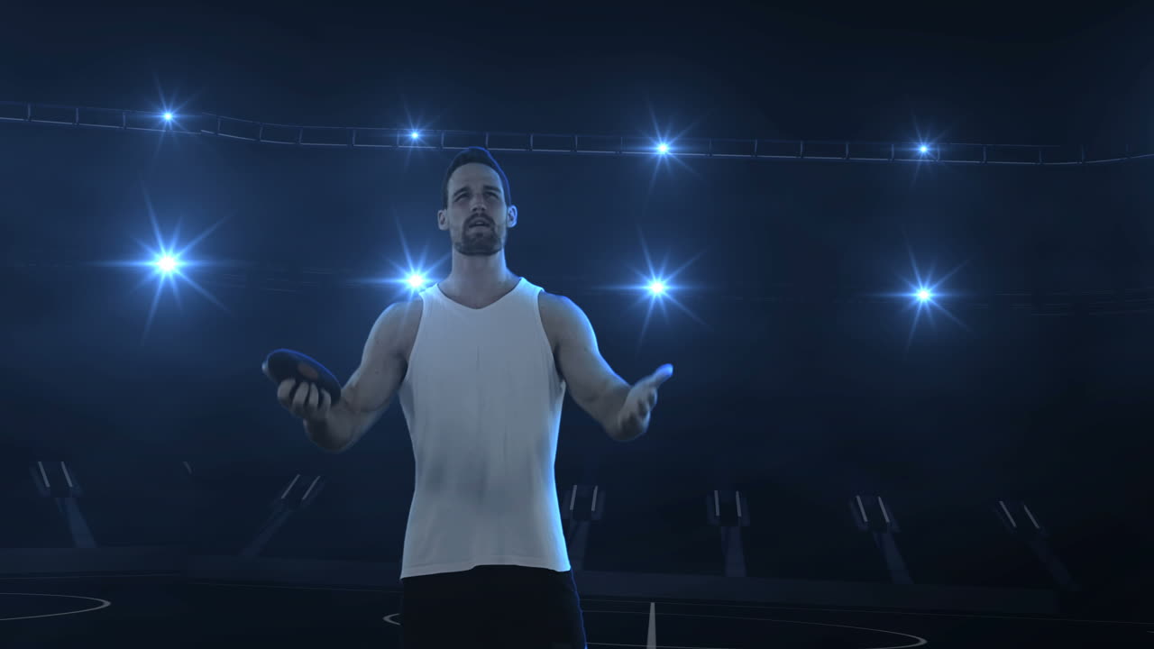 스포츠 선수 가 디스크 던지기 를 준비 하고 있다