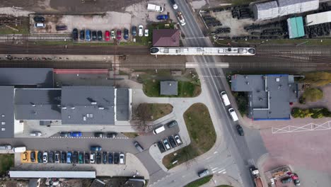 aerial view of railway station with arriving train