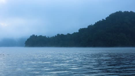 serene lake view with fog over forest