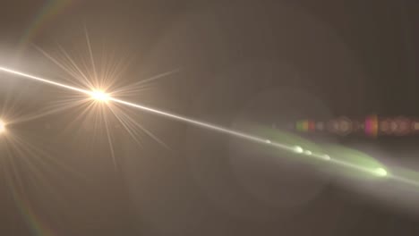 Animation-of-white-light-with-beam-and-prismatic-lens-flare-on-grey-background