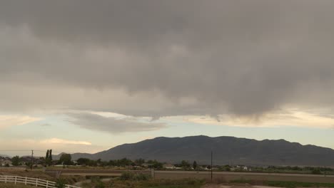 Rainclouds-and-precipitation-over-a-Eagle-Mountain,-Utah---time-lapse