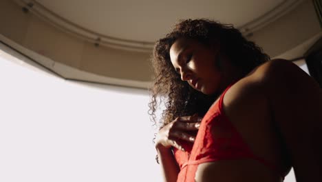 sensual portrait of a woman in red lingerie