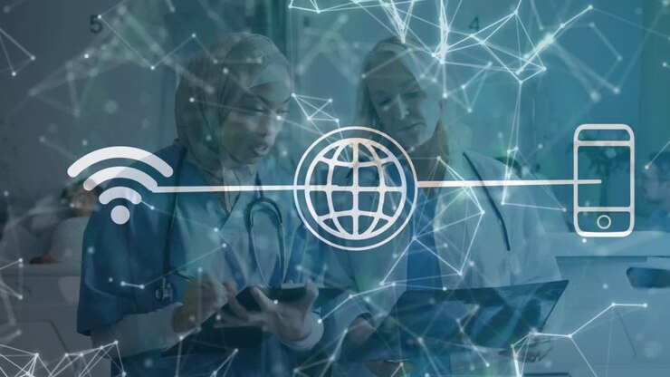 Healthcare team using tablet initiating network flow overlay while doctor reviewing folder in ward